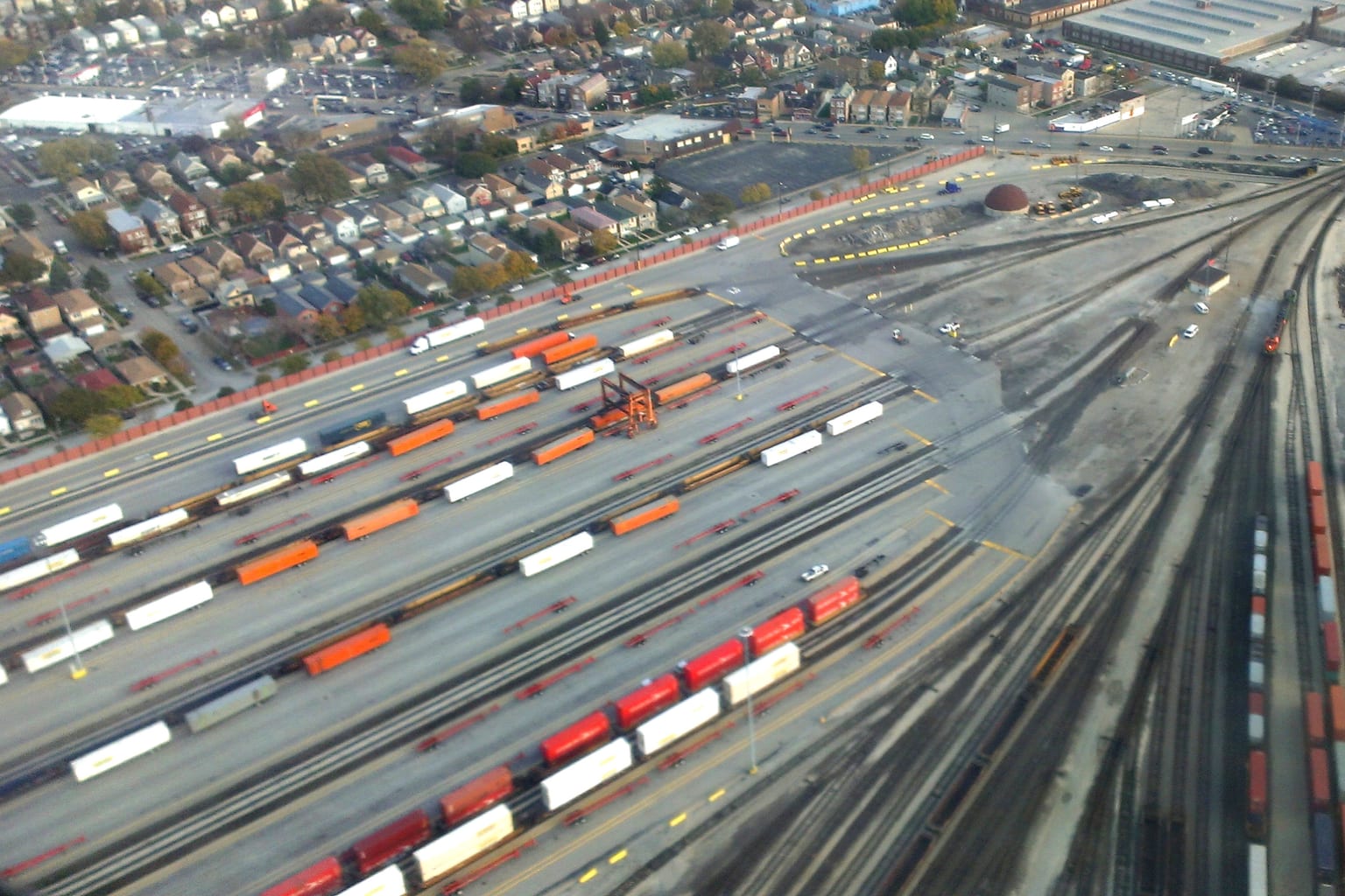 Container truck and intermodal rail cars at a Chicago rail-ramp market